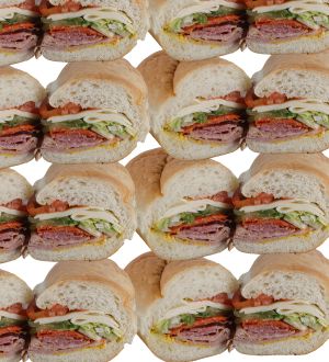 Sub sandwiches stacked. 